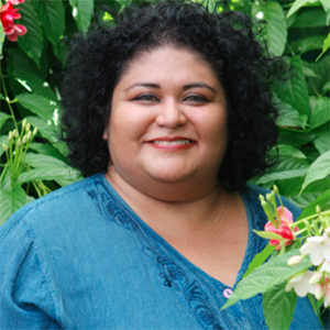 speaker ire'ne lara silva with luscious plant background