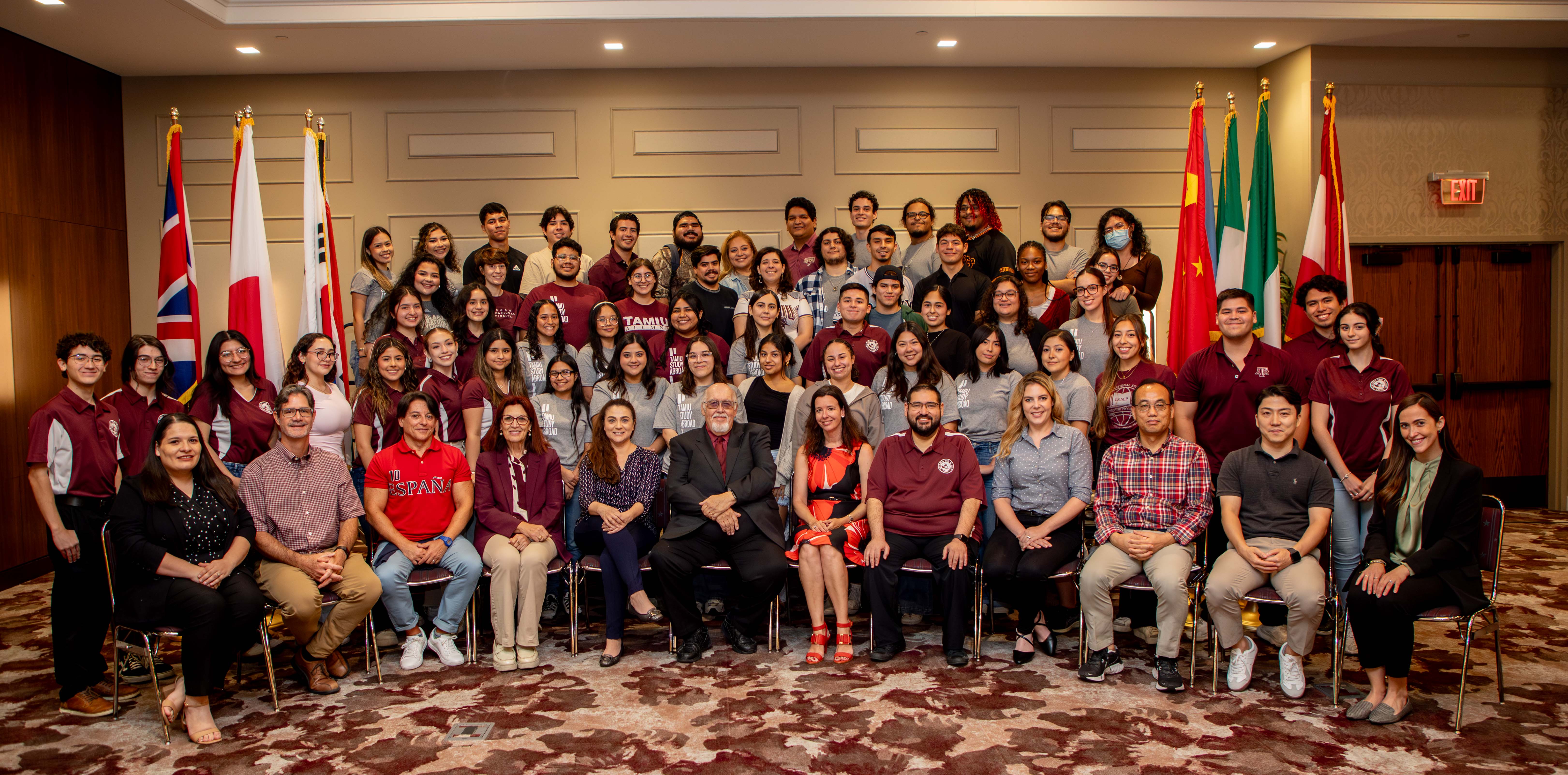 Group of students with mountains of Peru in the background