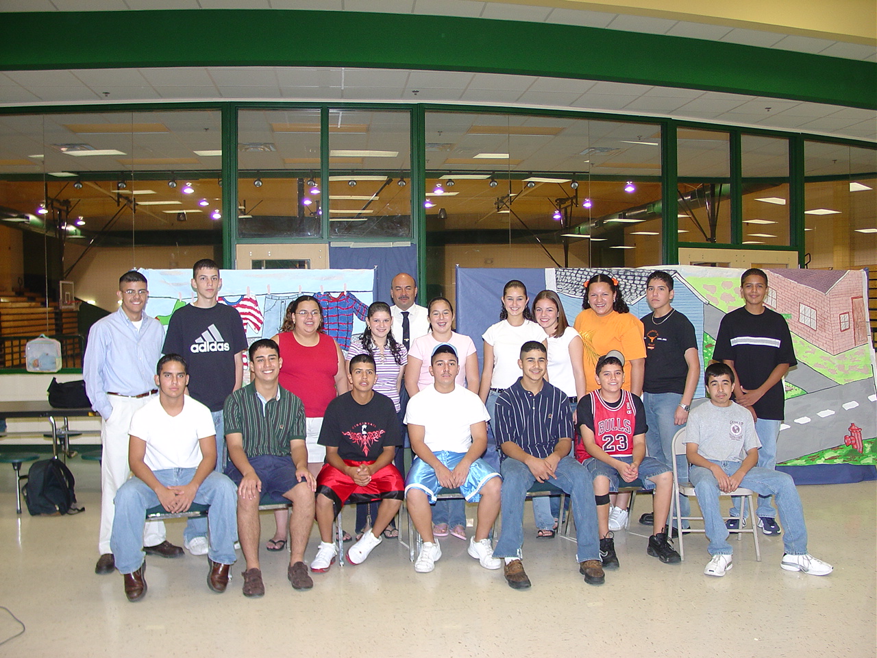 gear up play participants smiling in front of background scenes