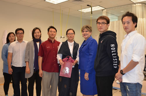 student donation recipients smiling for the camera