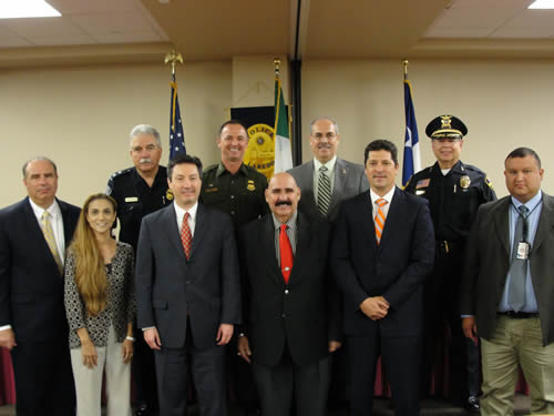 from left to right, front row, Dr. Claudia E. San Miguel, TAMIU associate professor of criminal justice; Dr. David Zimov, Consulate General of the U.S. in Nuevo Laredo, Tamaulipas, México; Raul Salinas, mayor, Laredo, Texas; Isidro Alaniz, district attorney, Webb and Zapata County; Lt. Federico Calderon, Webb County Sheriff’s Office. Back row, from left to right, David Villarreal, FBI; Commander Robert Harris, Border Patrol; U.S. Customs and Border Protection Port Director Gene Garza; Ángel Moreno, U.S. Attorney’s Office for the Southern District of Texas and Jesús Torres, assistant chief, Laredo Police Department.