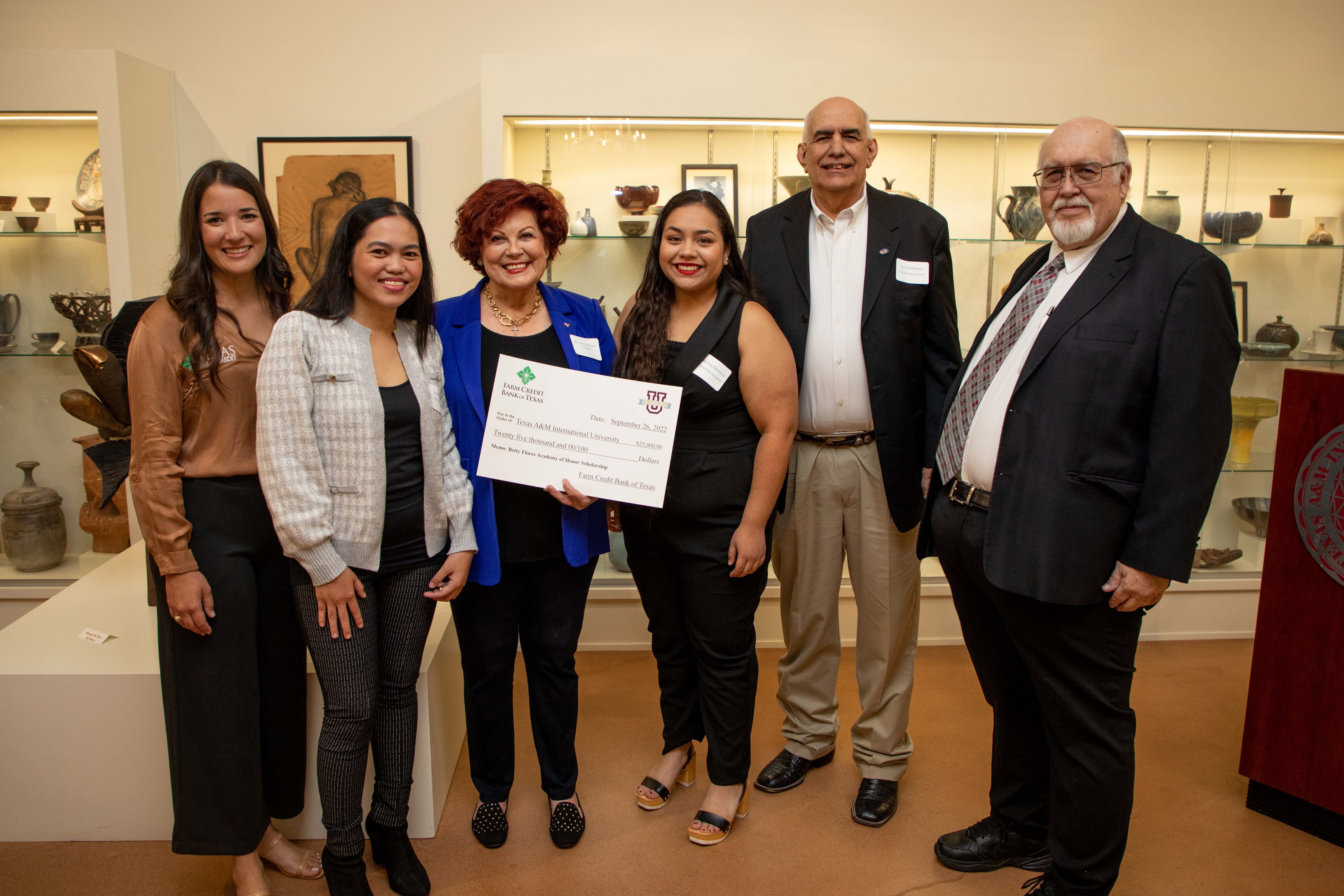 Betty Flores pictured with recipients