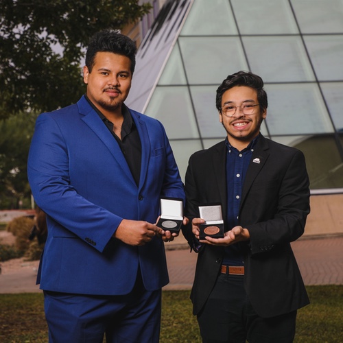 Mario Fuentes and Peter Salinas receive awards