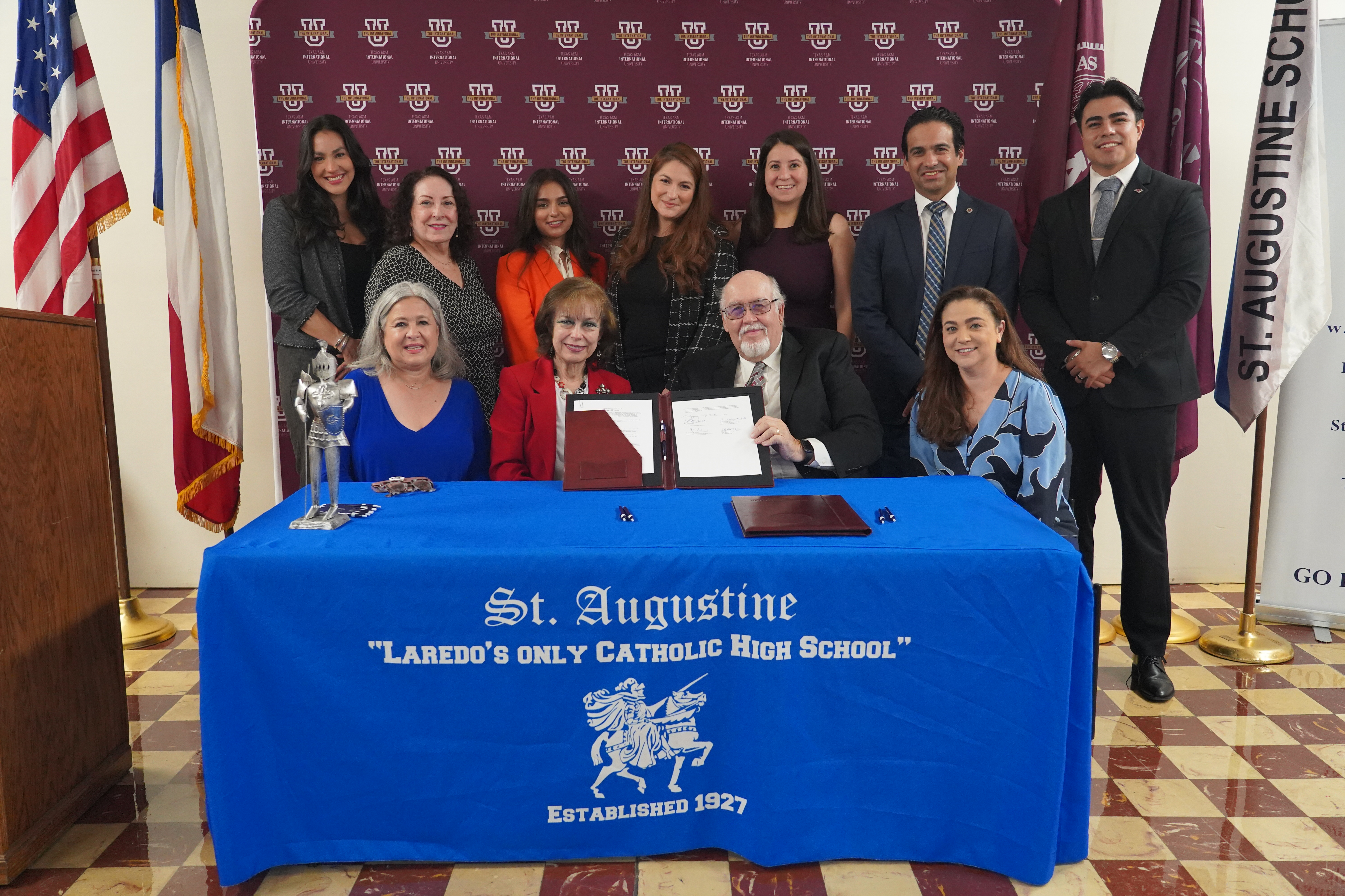 TAMIU administration and staff alongside St. Augustine High School Staff