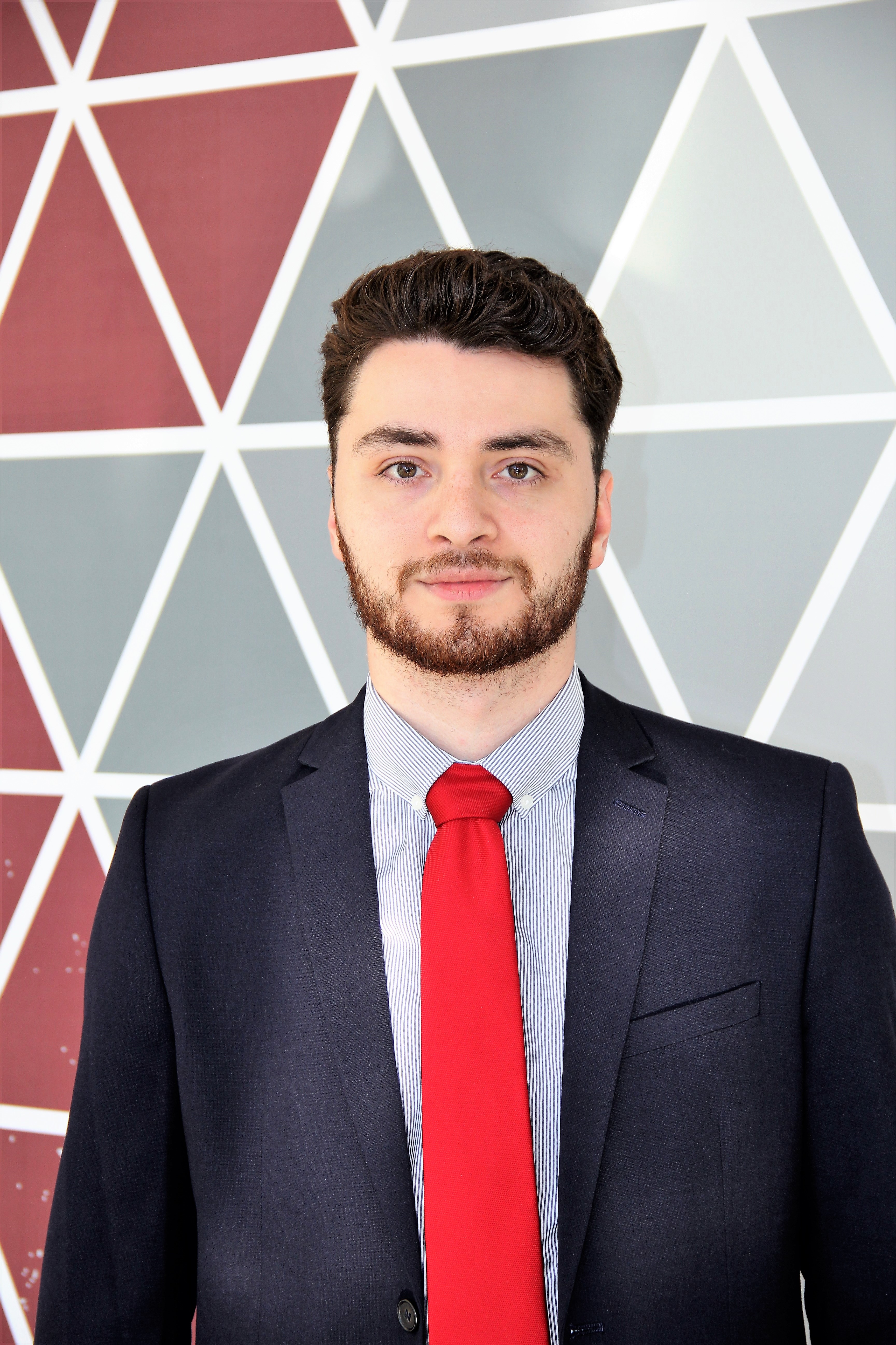 Man in front of wall