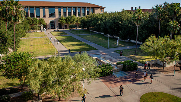 TAMIU glitter letters