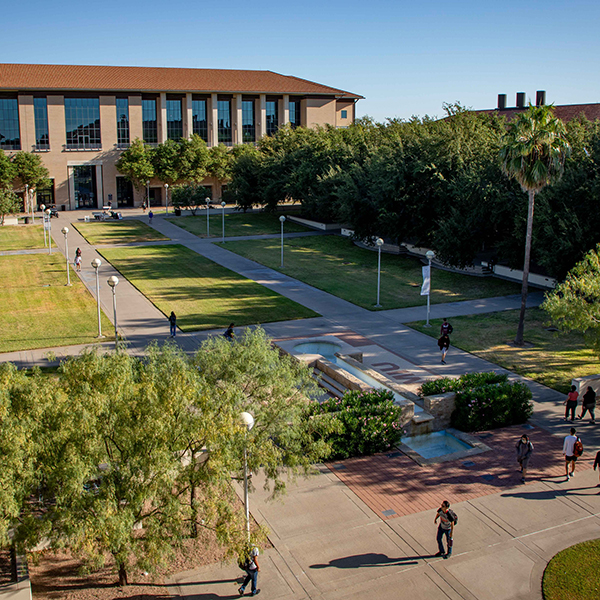 TAMIU glitter letters